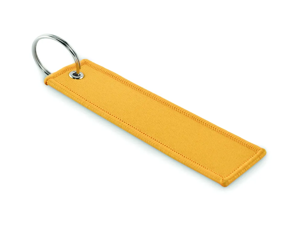 Takeoff · Sleutelhanger "remove before fligh – Geel